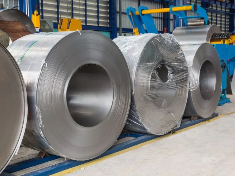 Steel coils and sheets stored in an industrial manufacturing facility