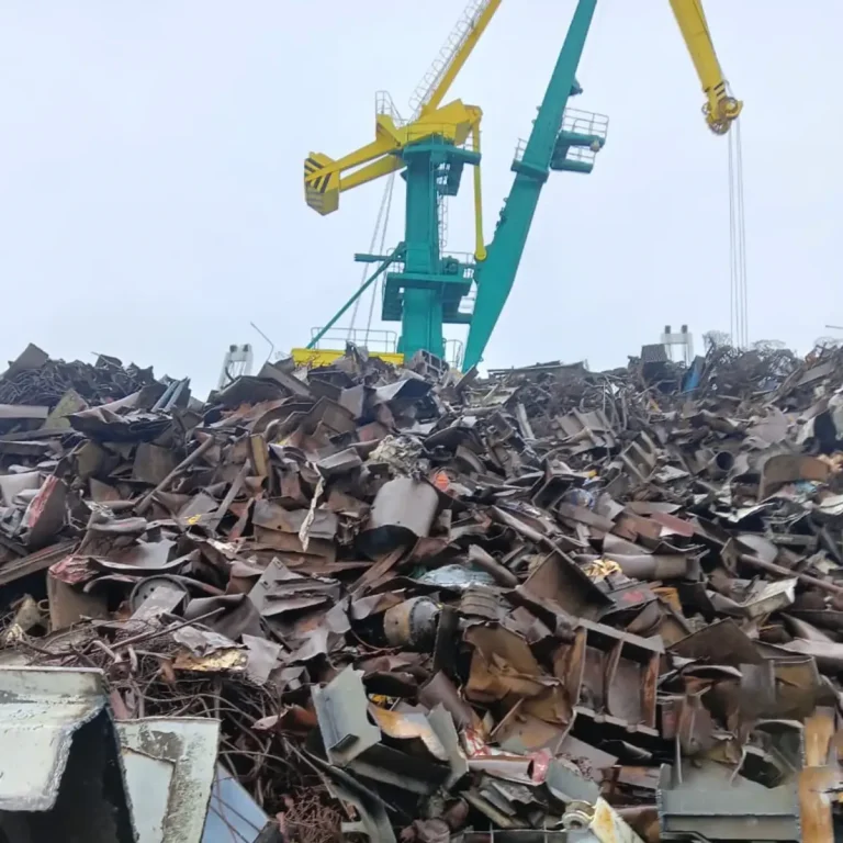 Steel scrap yard with heavy metal waste prepared for recycling and processing